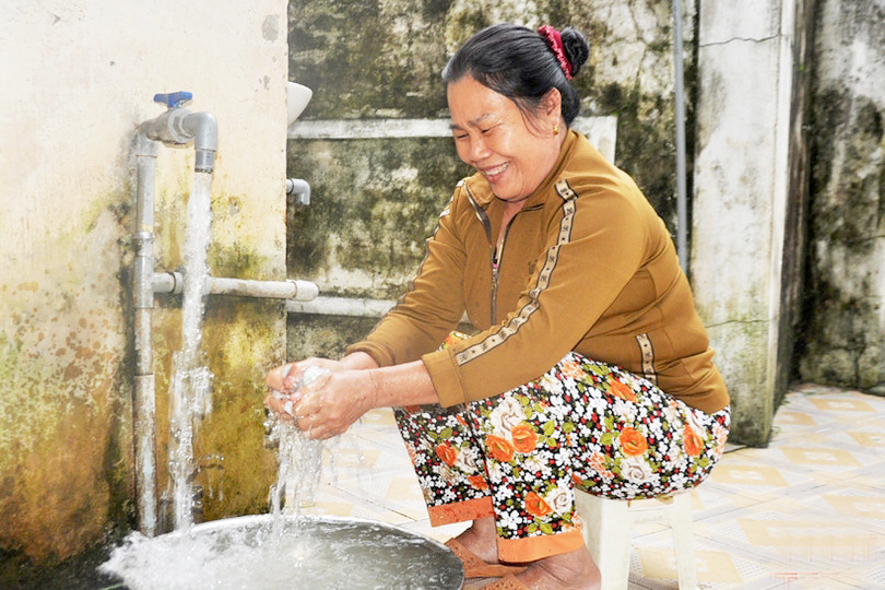 nguoi dan su dung nuoc sach